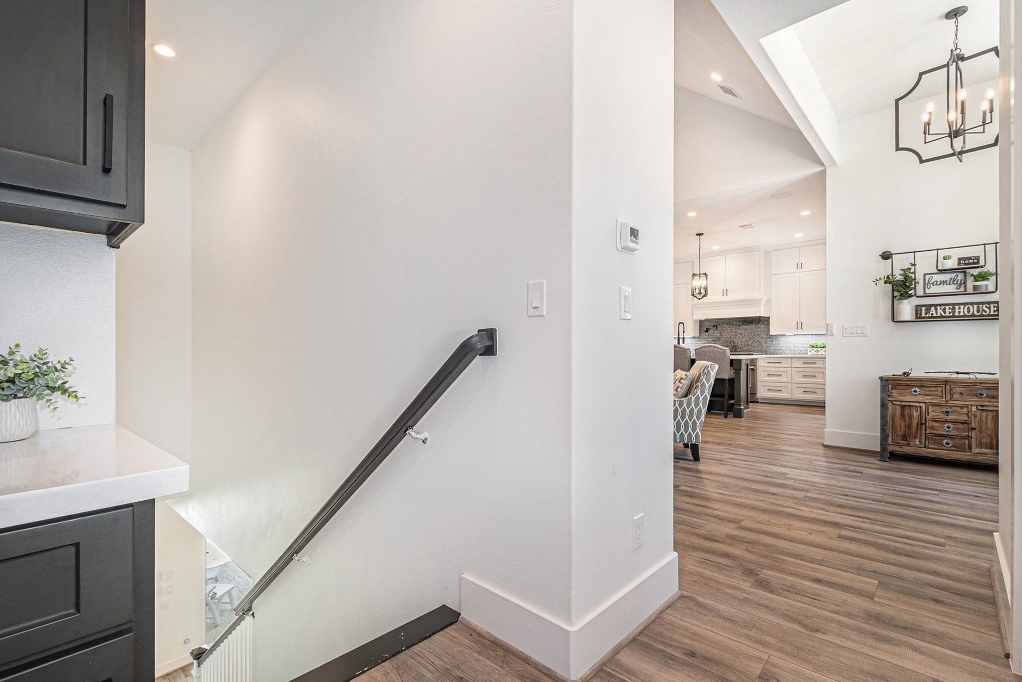 111 Seagull Path Point Blank, TX 77364 - Photo 25 of 50 Staircase leading down to lower level with it's own entrance.