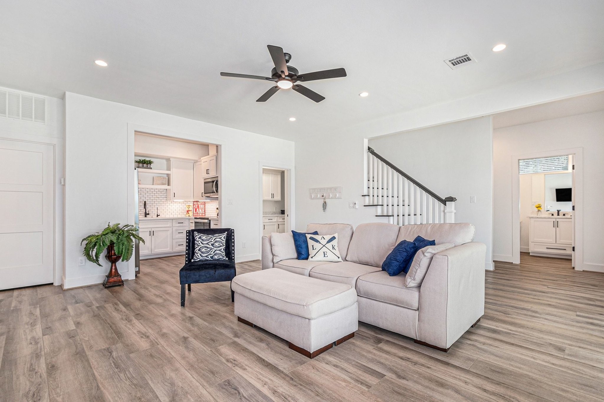 111 Seagull Path Point Blank, TX 77364 - Photo 28 of 49 a living room with furniture and a wooden floor