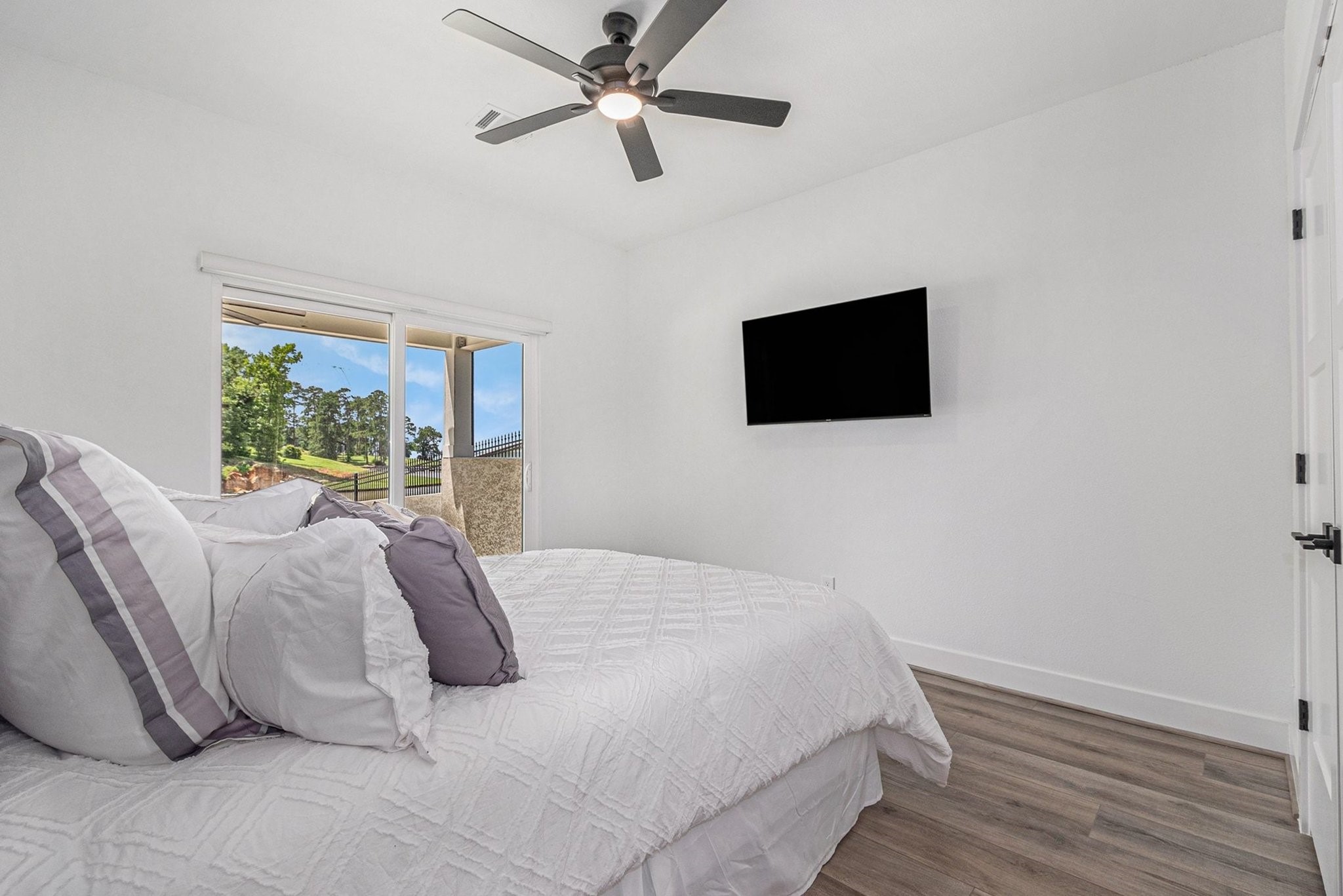 111 Seagull Path Point Blank, TX 77364 - Photo 32 of 50 Bedroom #2 with view and TV.