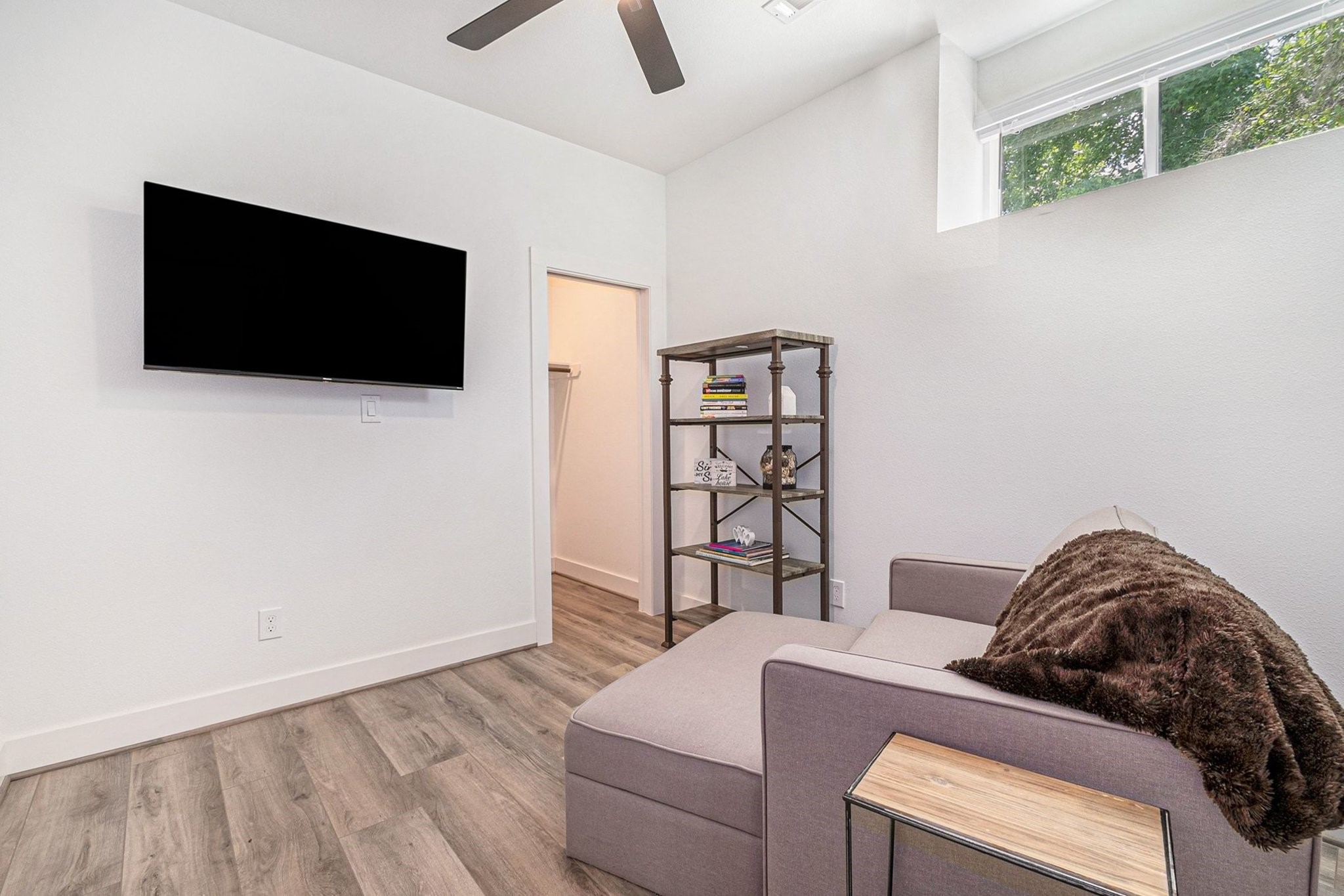 111 Seagull Path Point Blank, TX 77364 - Photo 34 of 50 Bedroom #3 with TV and big closet.