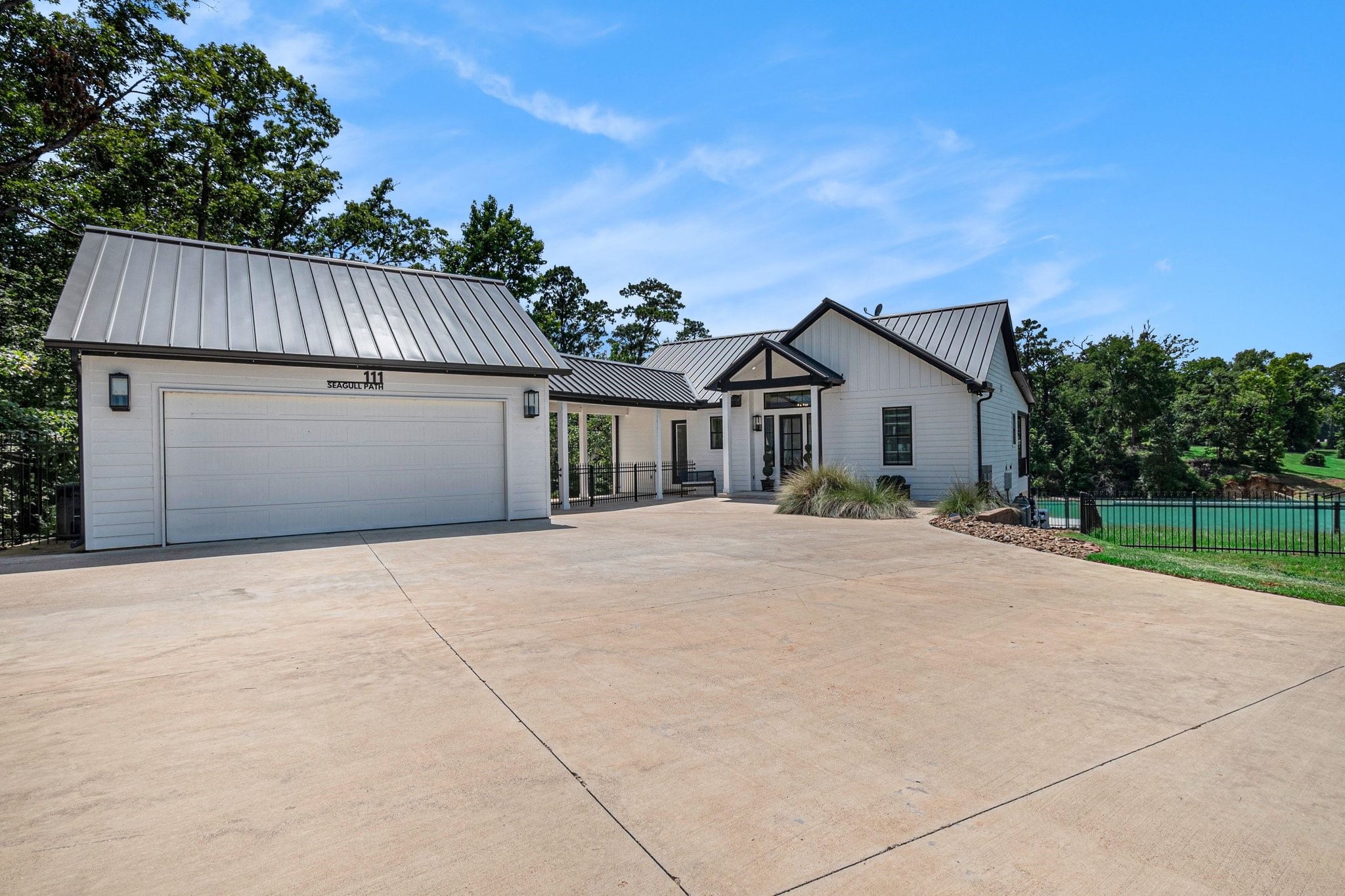 111 Seagull Path Point Blank, TX 77364 - Photo 9 of 49 Tons of parking and large garage with whole house generator!