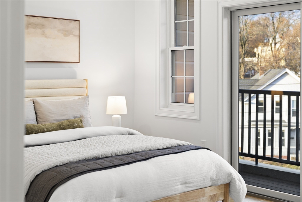 272 Lincoln Street, Unit 301 Marlborough, MA 01752 - Photo 15 of 30 a bedroom with a bed and a window