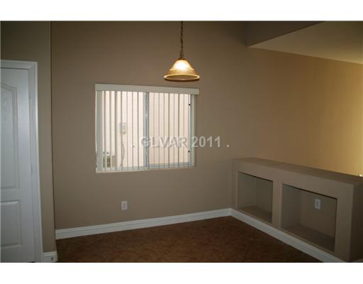 5899 Crumbling Ridge Street Henderson, NV 89011 - Photo 3 of 11 Dining Room.