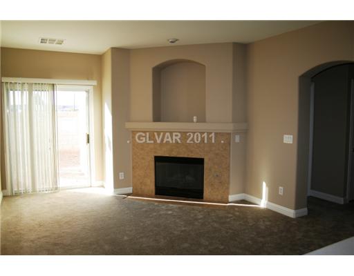 5899 Crumbling Ridge Street Henderson, NV 89011 - Photo 4 of 11 Living Room.