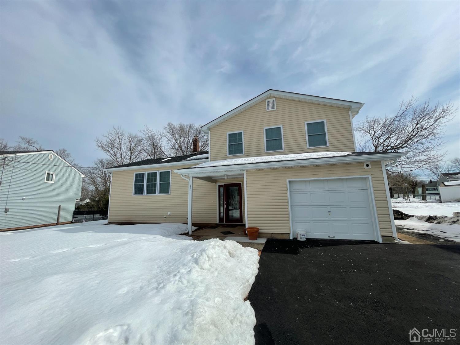 43 Hunt Road Somerset, NJ 08873 - Photo 1 of 21 a front view of a house with a garage