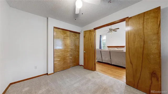 a view of a kitchen with a sink and cabinet