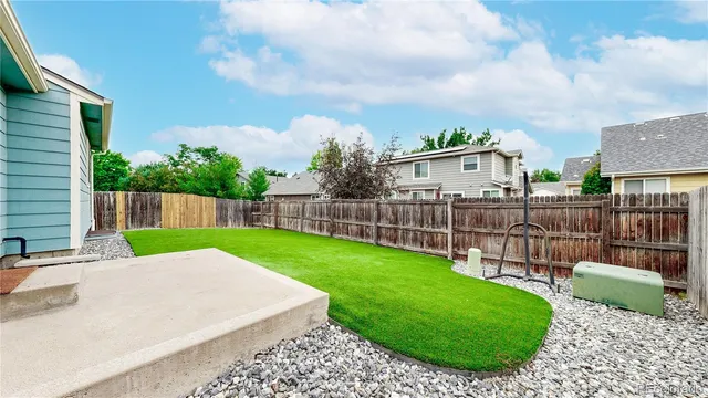 a view of a backyard with a garden