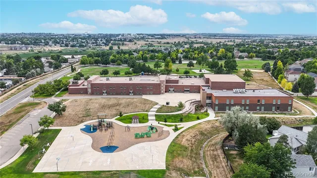 an aerial view of a house with outdoor space lake view