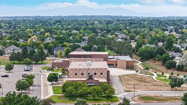 an aerial view of a house with a garden