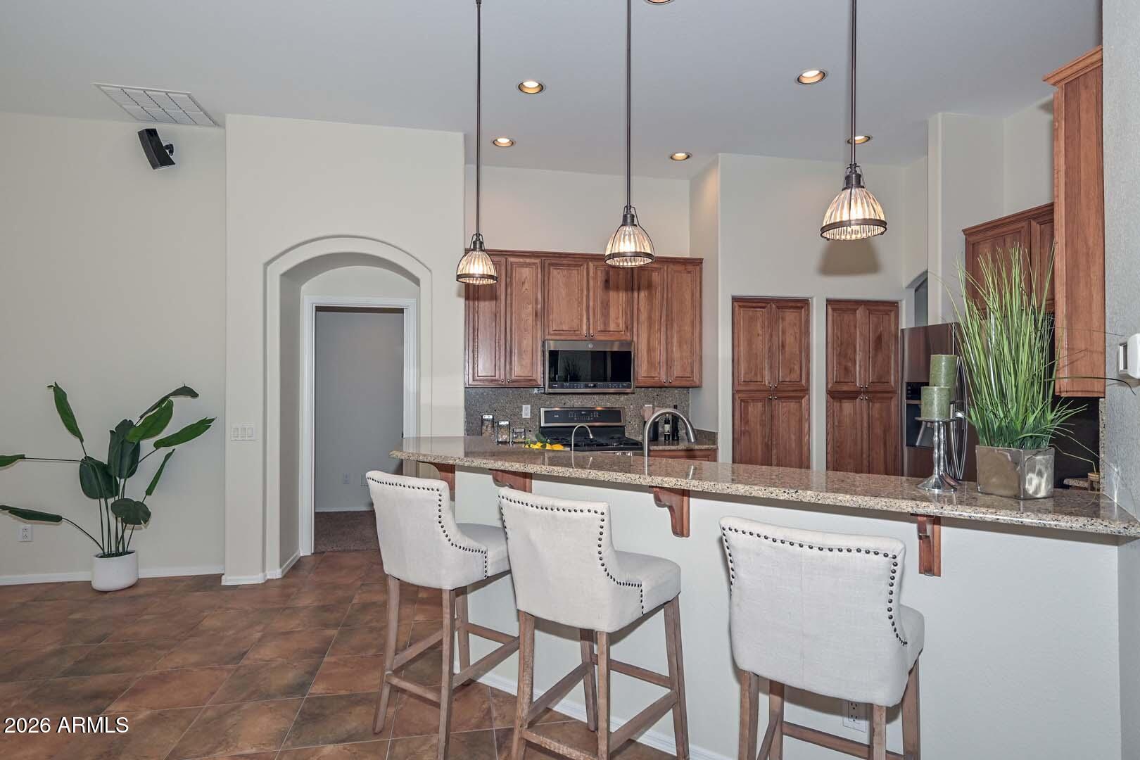 16081 Piccadilly Road Goodyear, AZ 85395 - Photo 6 of 47 Kitchen-Bar