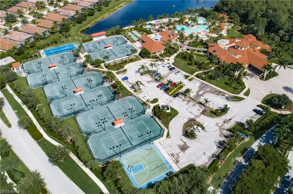 an aerial view of a house with a lake view