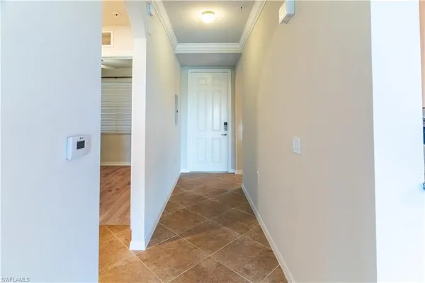 a view of a livingroom from a hallway