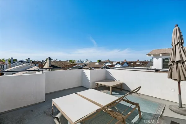 a view of a terrace with chairs