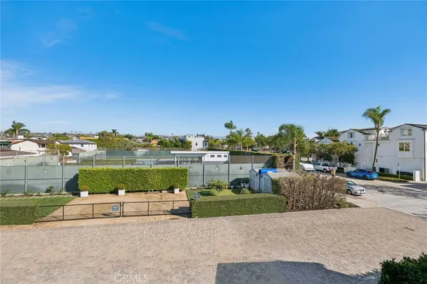 a view of a lake with a building in the background