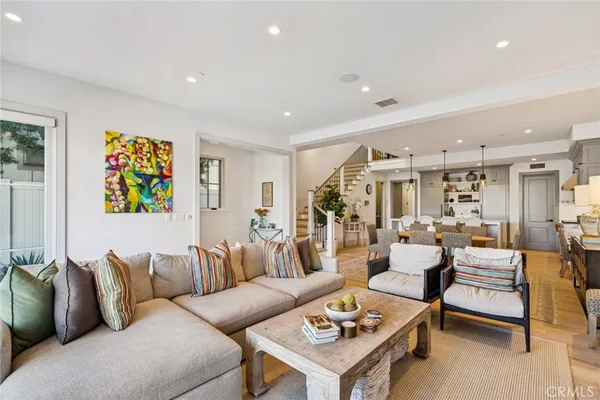 a living room with furniture and a table