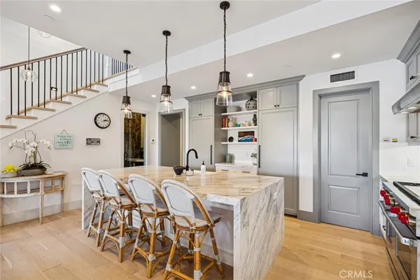 a view of a kitchen and dining room