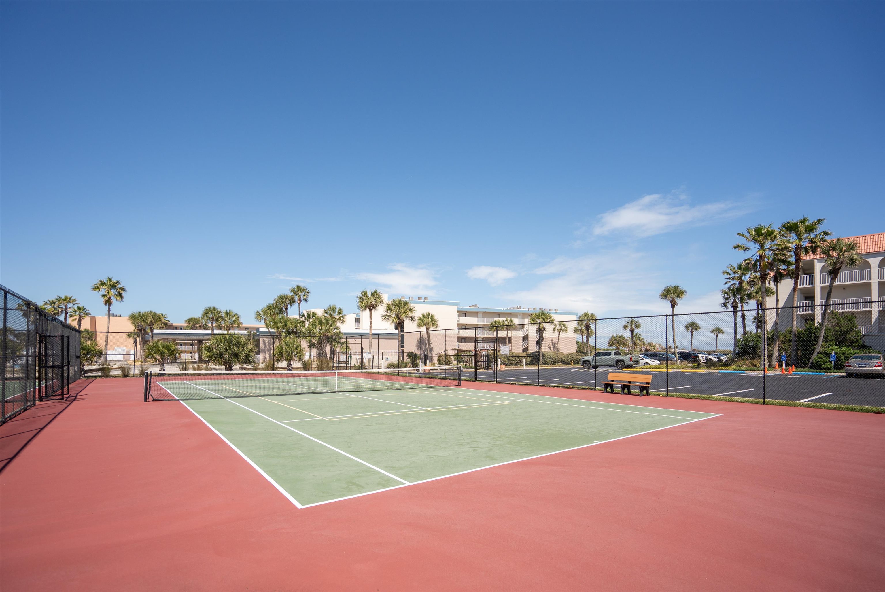 1 Ocean Trace Road, Unit 232 St. Augustine, FL 32080 - Photo 38 of 49 a view of a tennis ground with large trees