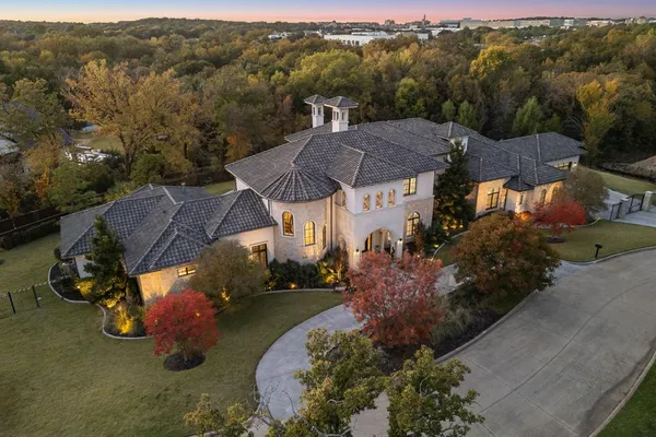 an aerial view of a house with a garden