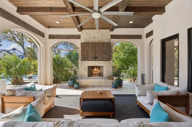 a bathroom with double vanity sink and a bathtub