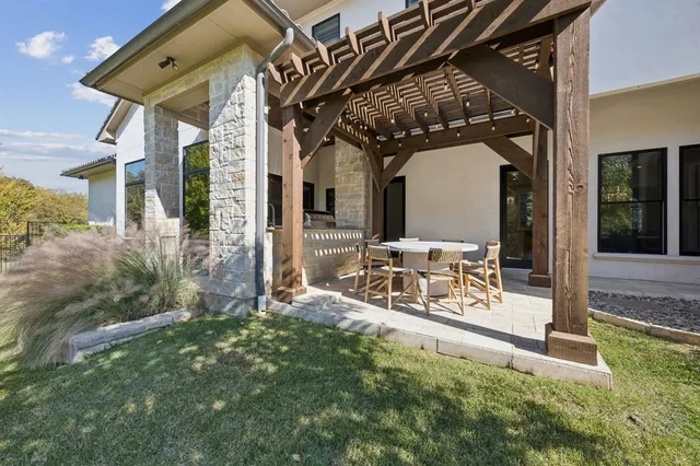 a outdoor living space with patio furniture and a potted plant