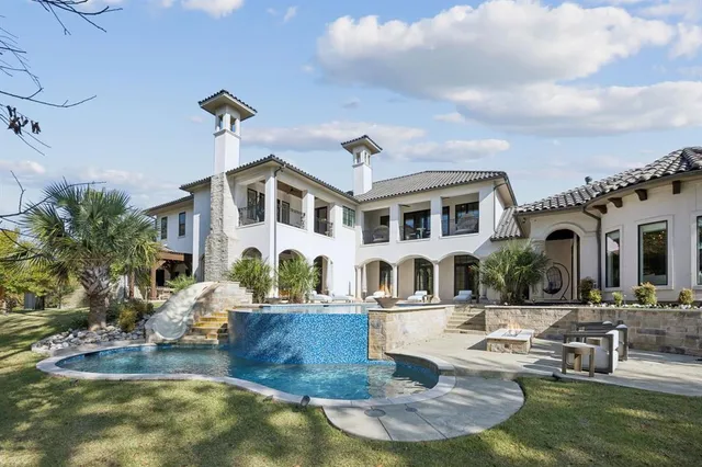 a front view of a building with outdoor seating