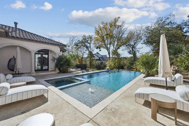 a view of house with yard