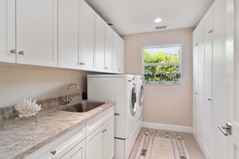 183 Beacon Lane Jupiter Inlet Colony, FL 33469 - Photo 30 of 39 26_183BeaconLane_44_LaundryRoom_FlexMLS8