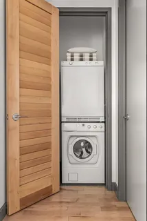 a utility room with washer and dryer