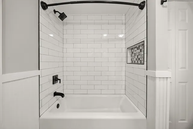 a bathroom with a bathtub