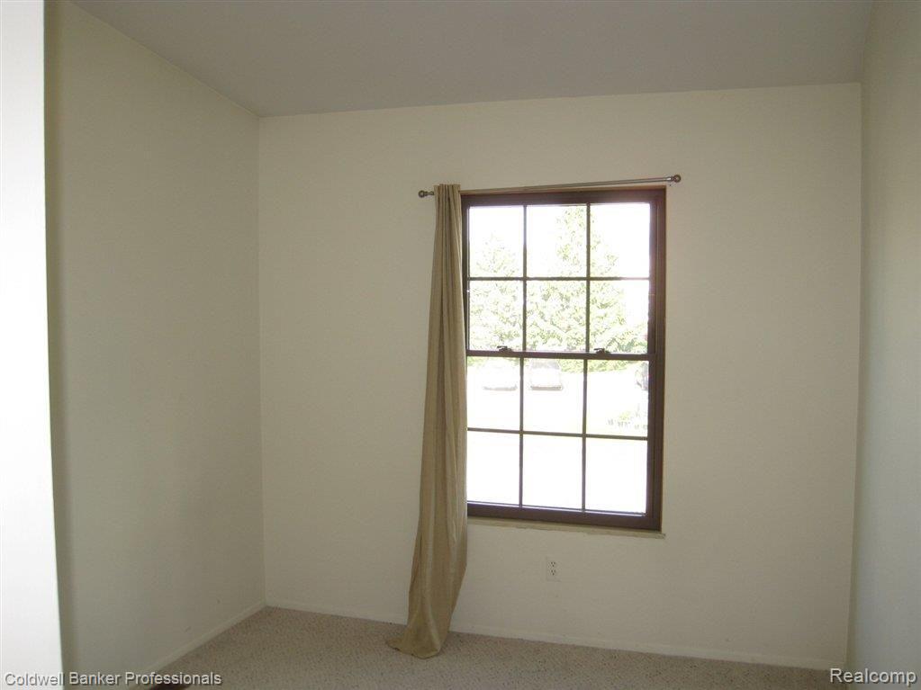 22181 Pondview, Unit 35 Novi, MI 48375 - Photo 3 of 8 Bedroom 2.JPG