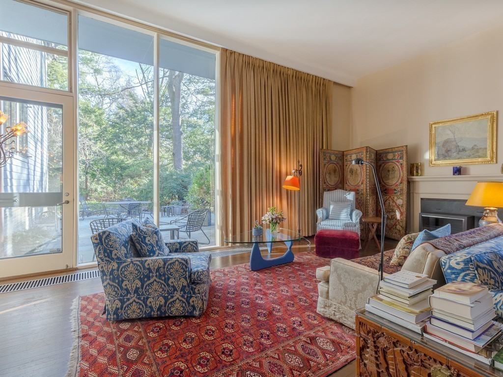 106 Sargent Road Brookline, MA 02445 - Photo 1 of 20 a living room with furniture and a large window