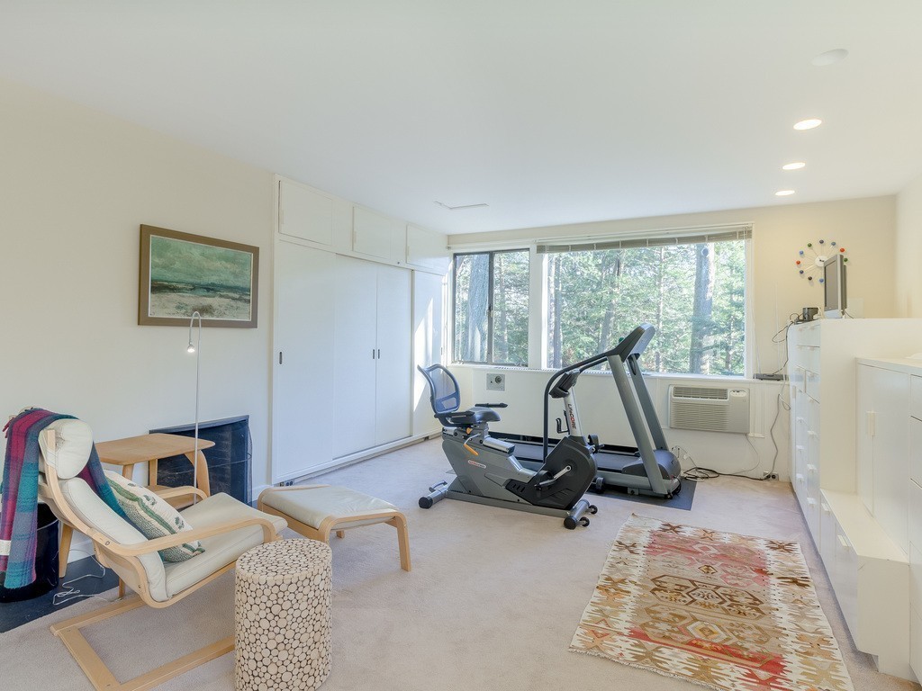 106 Sargent Road Brookline, MA 02445 - Photo 18 of 20 a view of a workspace with furniture and a window