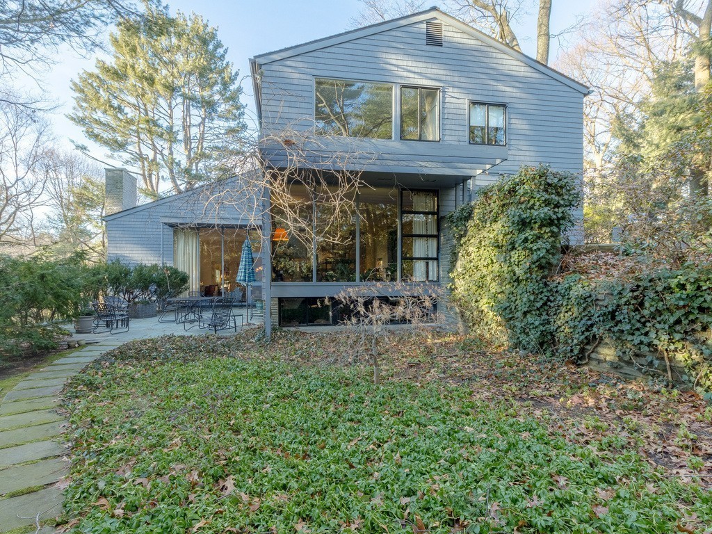 106 Sargent Road Brookline, MA 02445 - Photo 3 of 20 a view of house with backyard and sitting area