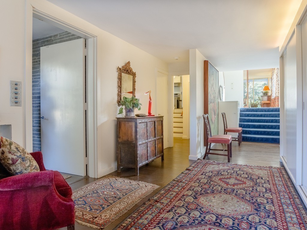 106 Sargent Road Brookline, MA 02445 - Photo 5 of 20 a living room with furniture and a rug