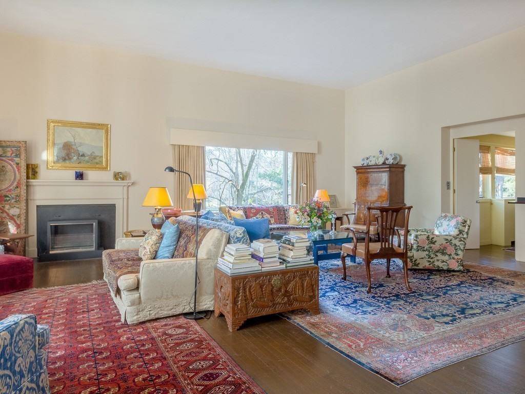 106 Sargent Road Brookline, MA 02445 - Photo 6 of 20 a living room with furniture and a fireplace
