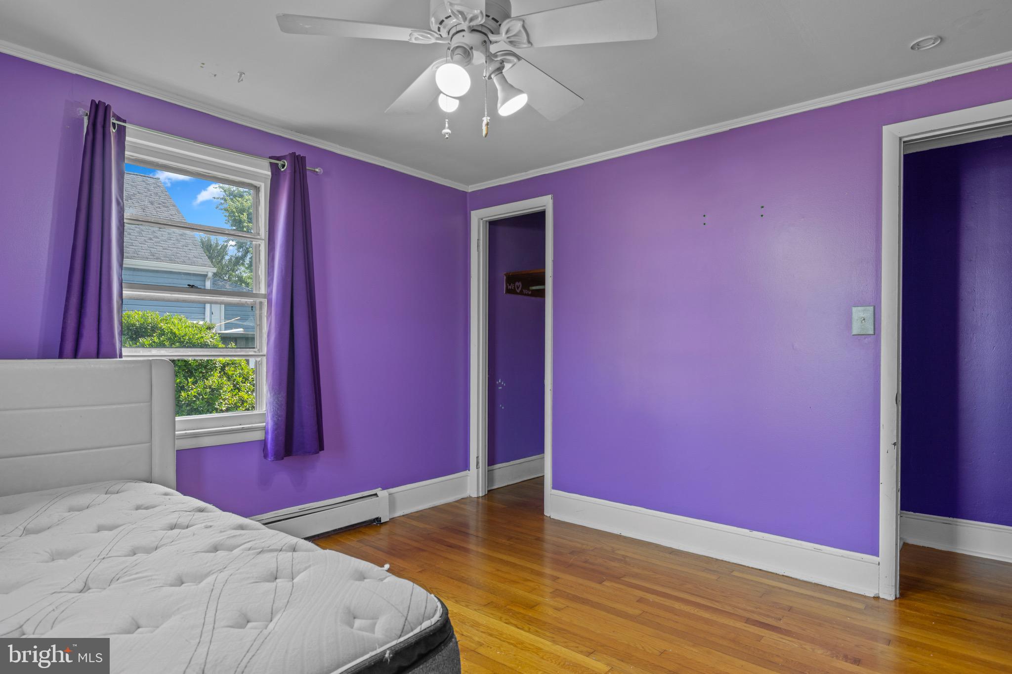 102 Roe Street Greensboro, MD 21639 - Photo 28 of 42 a bedroom with a bed and a window