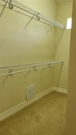 a view of a room with racks on the wall