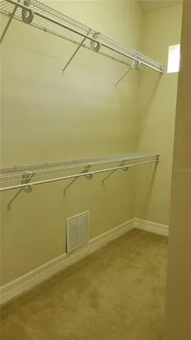 a view of a room with racks on the wall