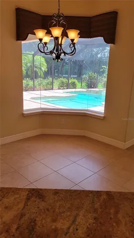 view of an empty room with a window