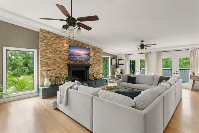 a living room with furniture and a window