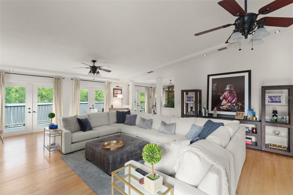 101 Lee Street Windermere, FL 34786 - Photo 13 of 63 a living room with furniture and a flat screen tv