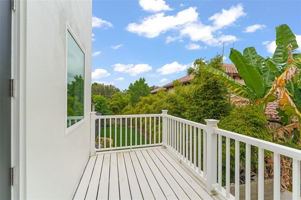 101 Lee Street Windermere, FL 34786 - Photo 29 of 63 a view of a balcony with wooden floor