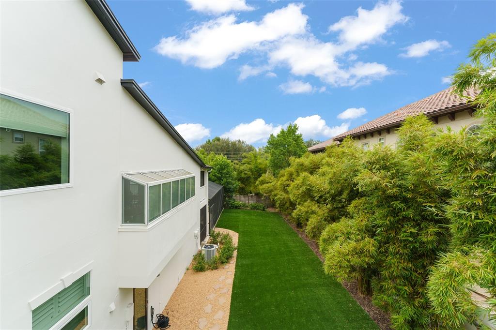 101 Lee Street Windermere, FL 34786 - Photo 30 of 63 a view of a house with a yard