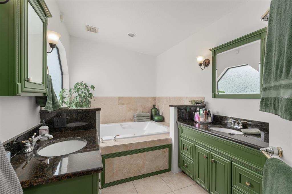 101 Lee Street Windermere, FL 34786 - Photo 31 of 63 a bathroom with a double vanity sink and a mirror