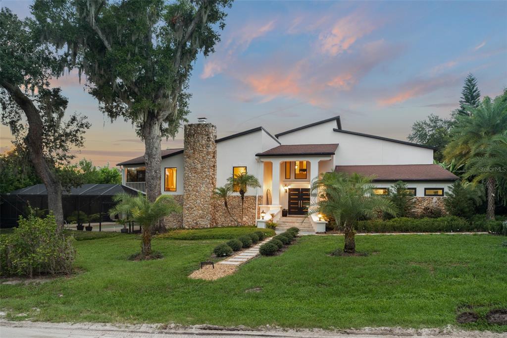 101 Lee Street Windermere, FL 34786 - Photo 59 of 63 a front view of a house with a yard