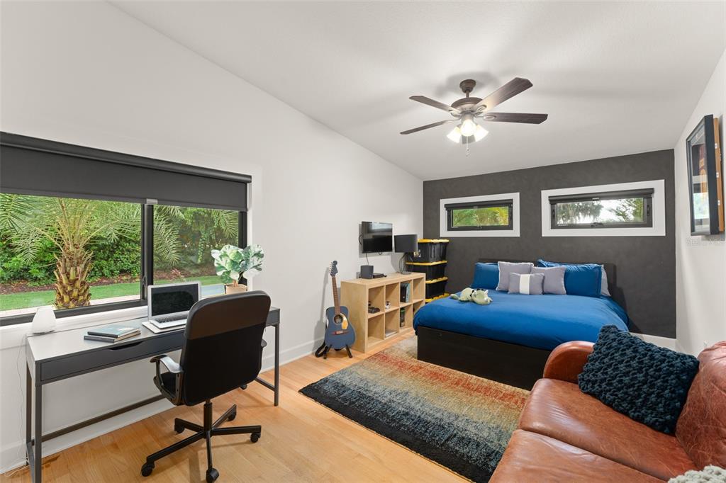 101 Lee Street Windermere, FL 34786 - Photo 9 of 63 a living room with furniture and a large window