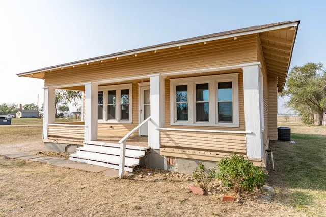 front view of house with a yard