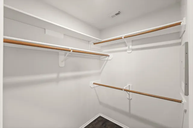 a view of a room with racks on the wall