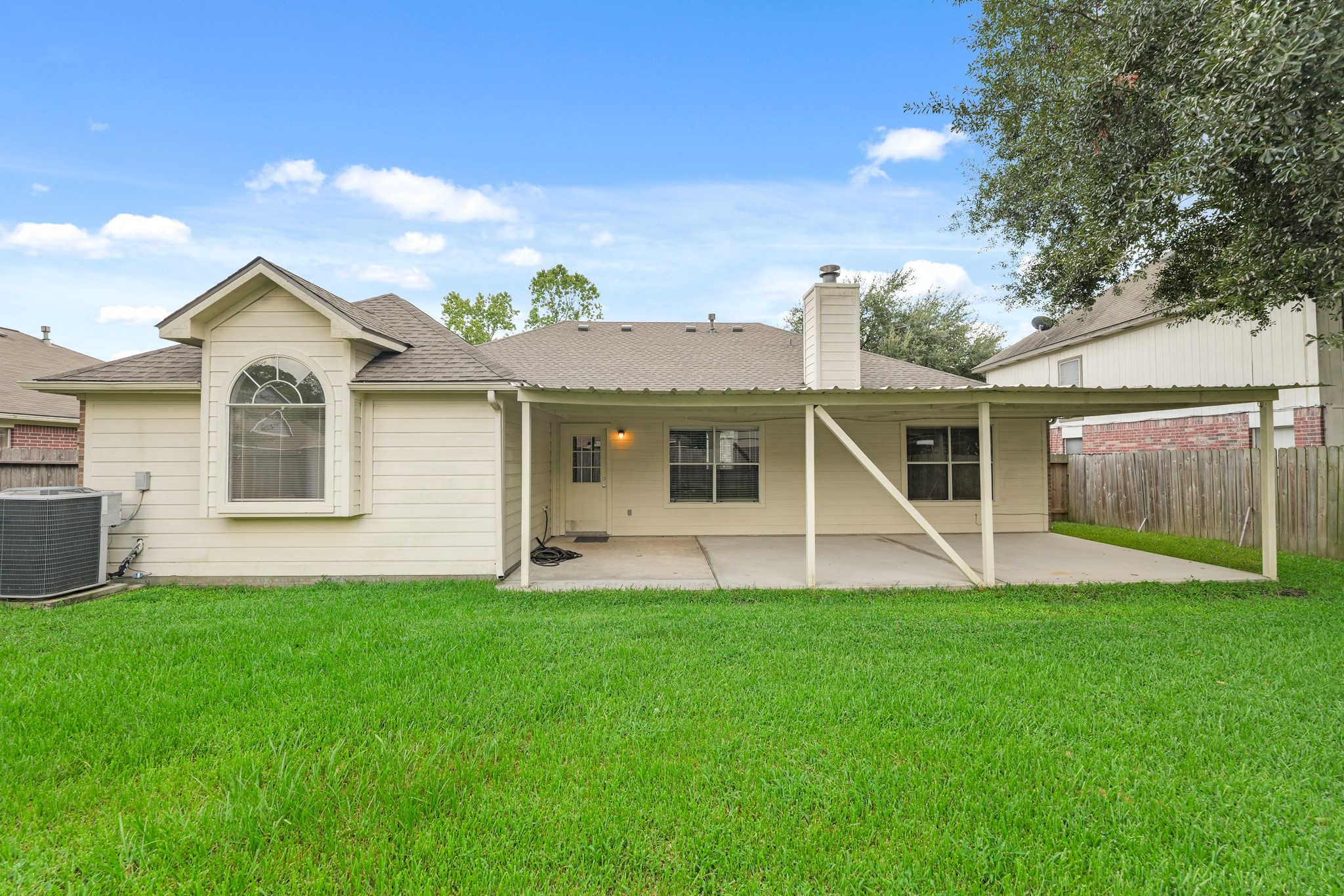 3651 Woodlace Drive Humble, TX 77396 - Photo 35 of 38 a view of a house with a yard and sitting area
