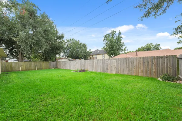 a view of a backyard with a garden